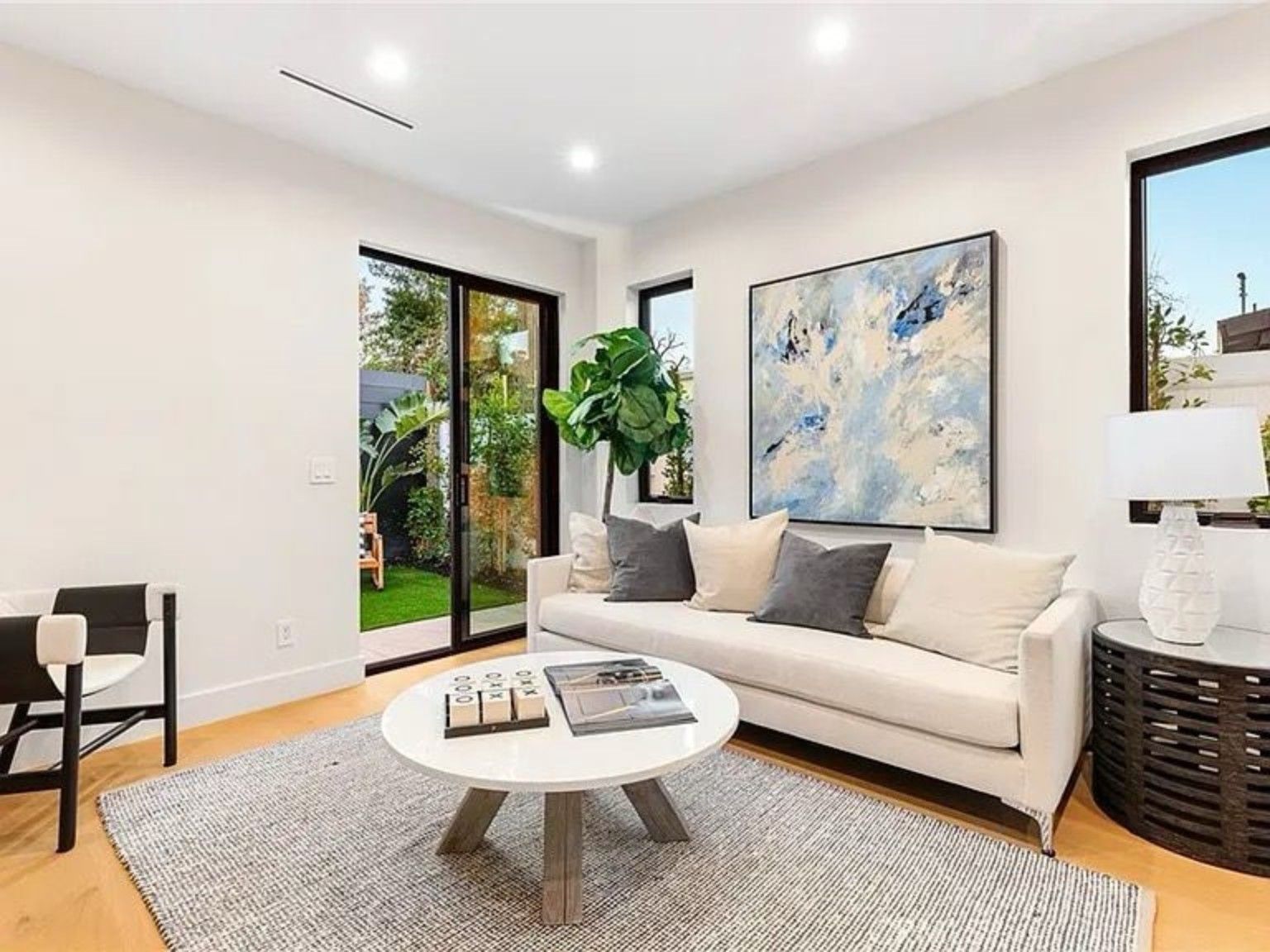 Living space opening to an outdoor seating area